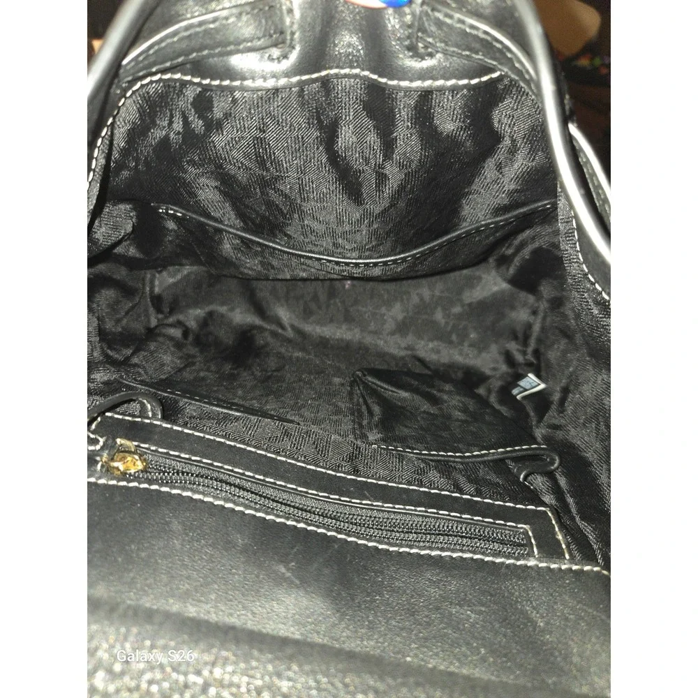 11. Michael Kors Greenwich Medium Black Pebbled Leather Backpack 30S6GRUB2L